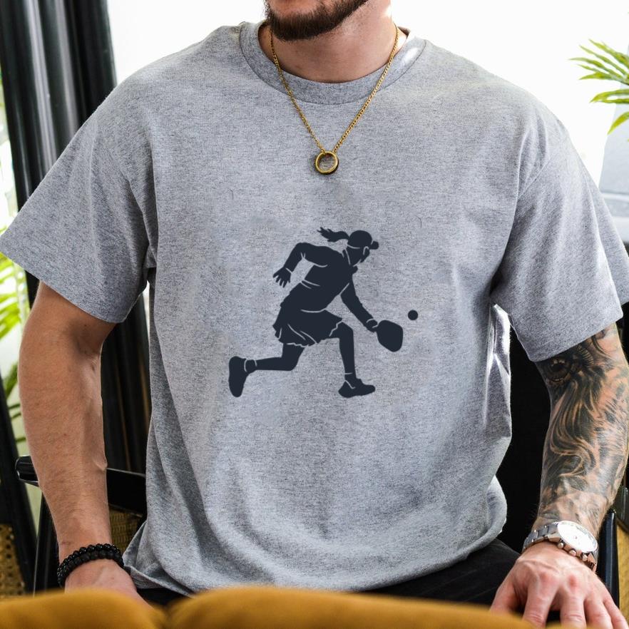 Silhouette Of A Woman Running With A Pickeball Racket T-Shirt